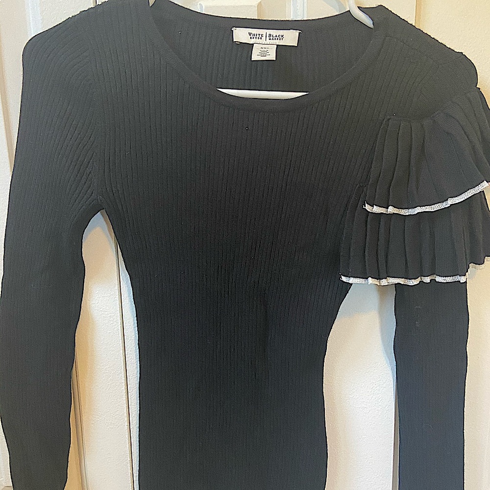 Black long sleeve with ruffle shoulder